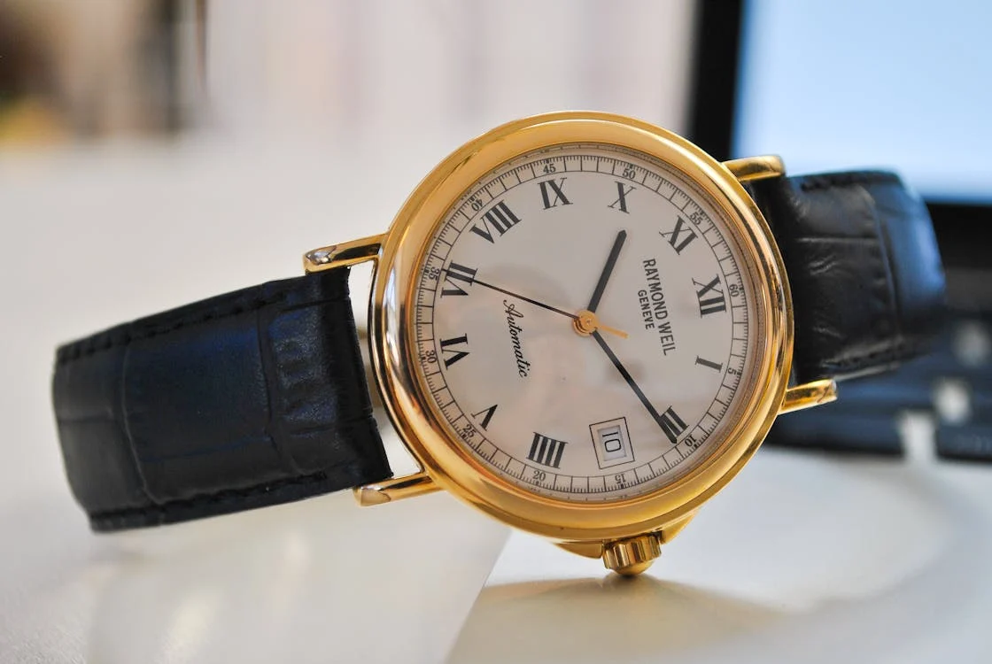 Round Gold-colored Analog Watch With Black Leather Strap