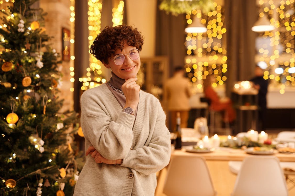 Woman in Gray Sweater Smiling